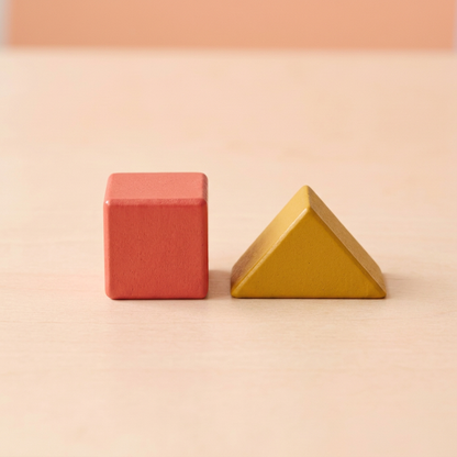 Coral cube and mustard triangular roof block detail