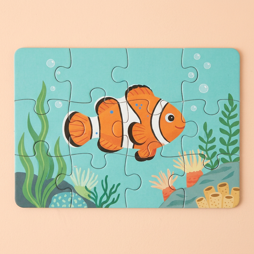 Orange clownfish jigsaw with green underwater plants