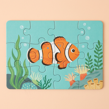 Orange clownfish jigsaw with green underwater plants