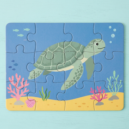 Green sea turtle jigsaw with blue water and yellow sand