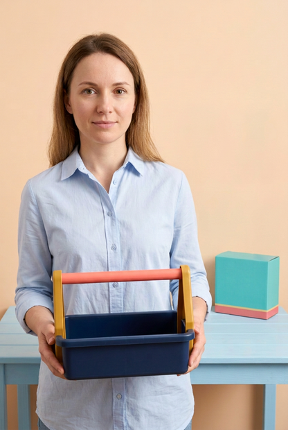 Adult female model holding toy tool caddy
