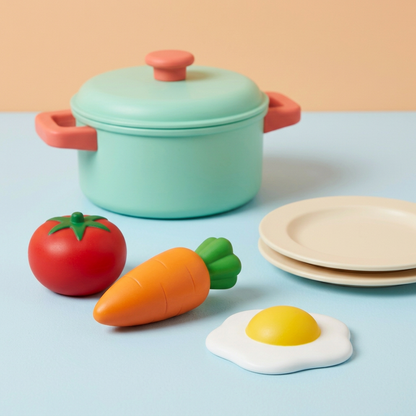 Toy tomato, carrot, egg and two plates