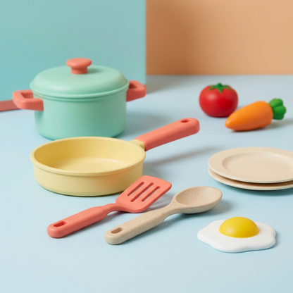 Yellow toy pan, spatula and spoon details